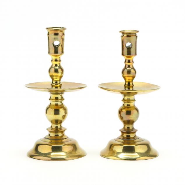 a-pair-of-early-brass-candlesticks