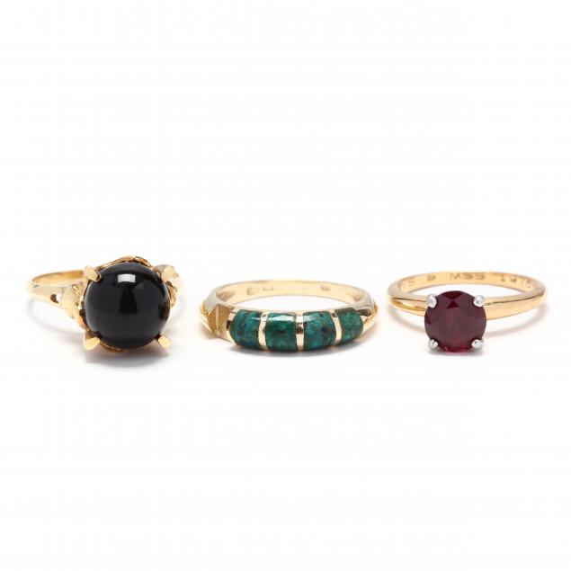 three-gold-and-gem-set-rings