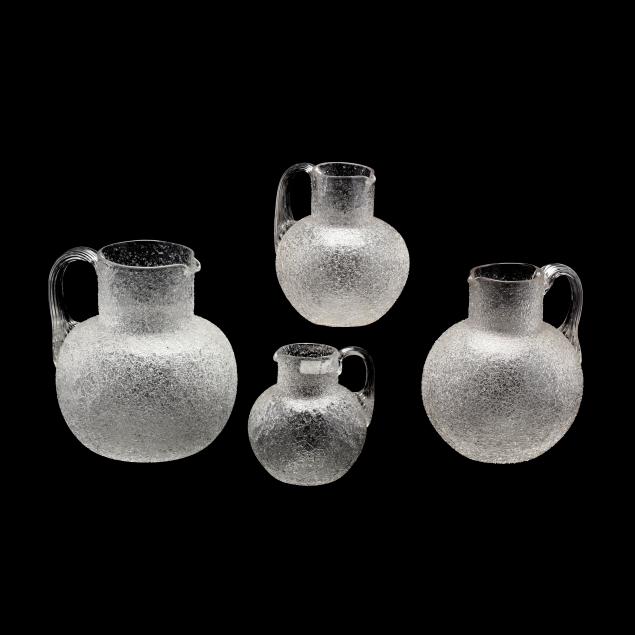 four-graduated-overshot-glass-pitchers