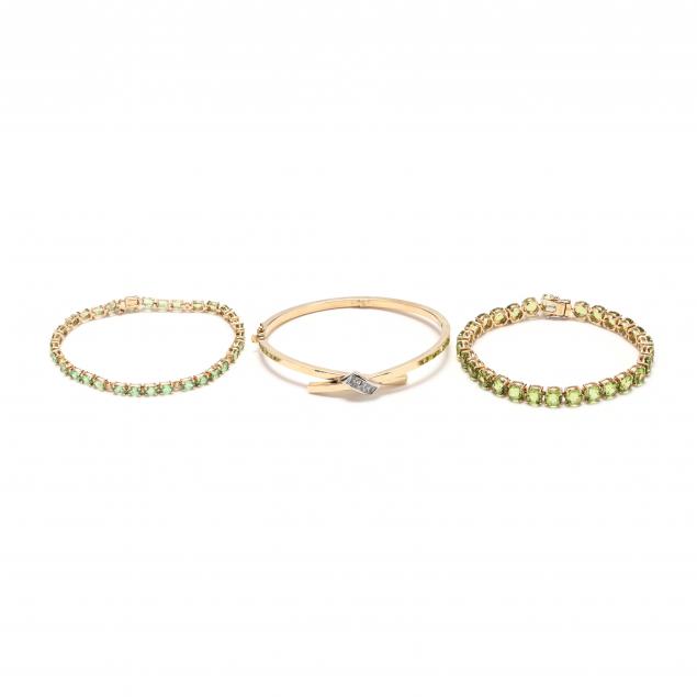 three-gold-and-gem-set-bracelets