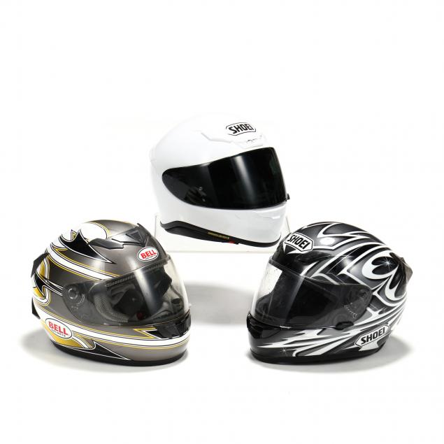 three-motorcycle-helmets