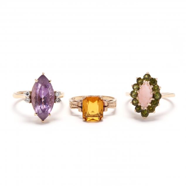 three-gold-and-gem-set-rings