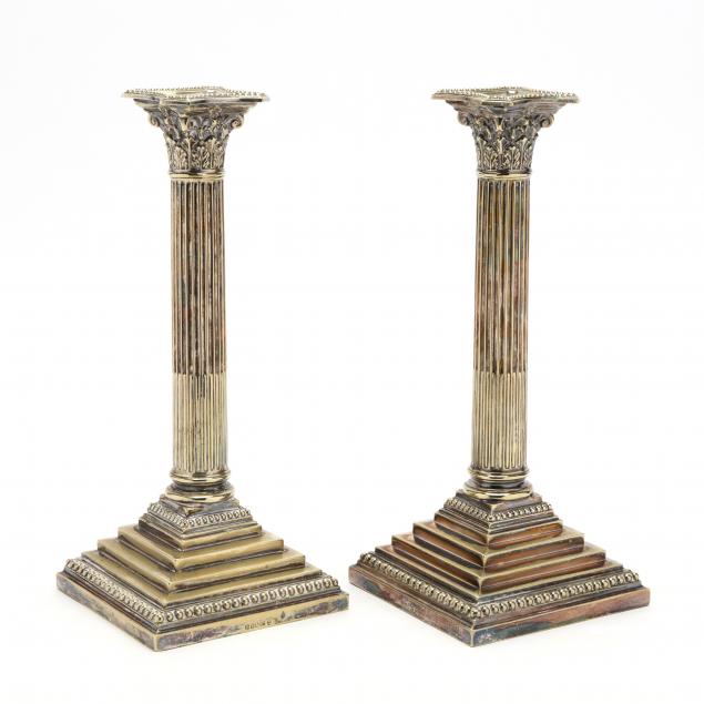 a-pair-of-antique-english-silverplate-corinthian-column-candlesticks
