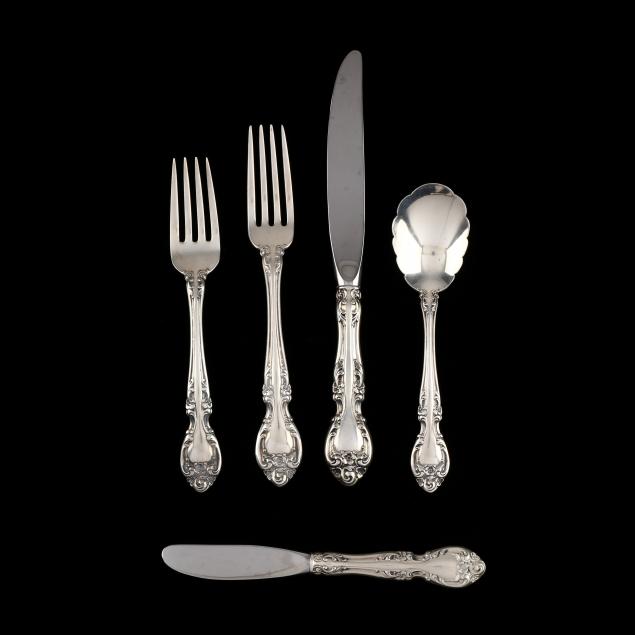 assorted-sterling-silver-flatware-and-baby-gifts