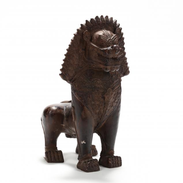 an-asian-style-bronze-tone-lion-sculpture
