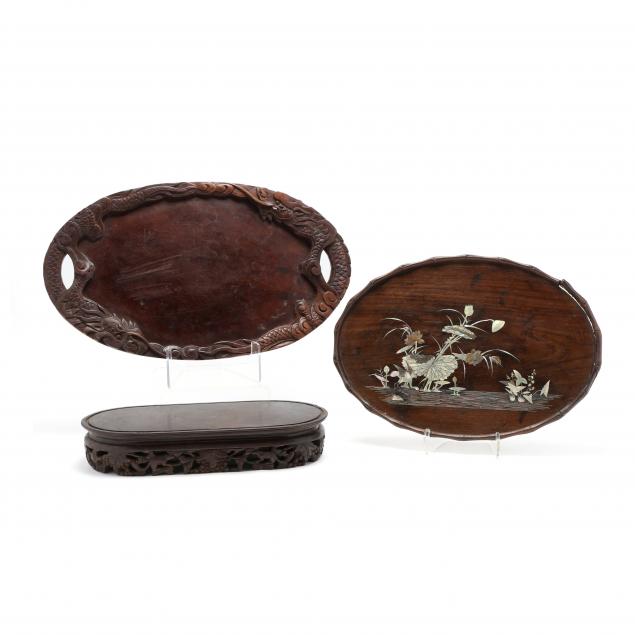 two-chinese-carved-wooden-trays-and-oval-stand