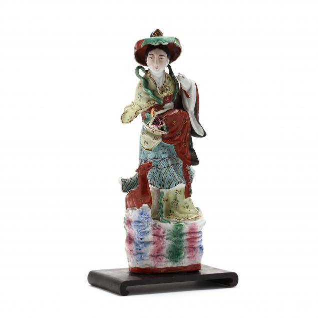 a-chinese-porcelain-figurine-with-stand