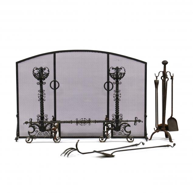 a-large-spanish-renaissance-style-iron-fireplace-set