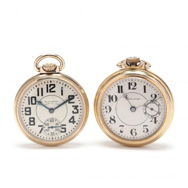 two-antique-open-face-pocket-watches