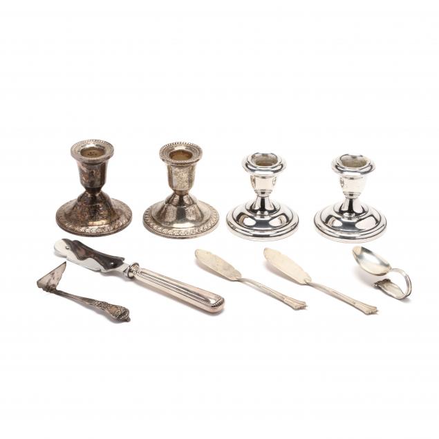 sterling-silver-flatware-and-candlesticks