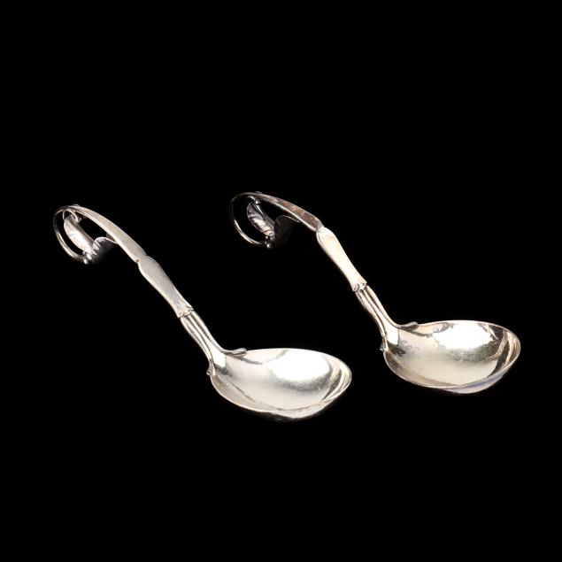 a-pair-of-georg-jensen-sterling-silver-ornamental-ladles-141