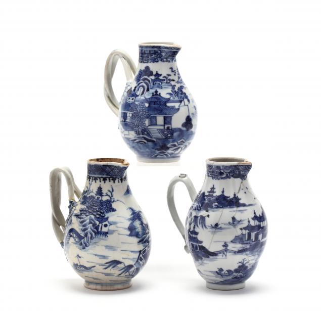 three-antique-chinese-export-small-blue-and-white-decorated-pitchers