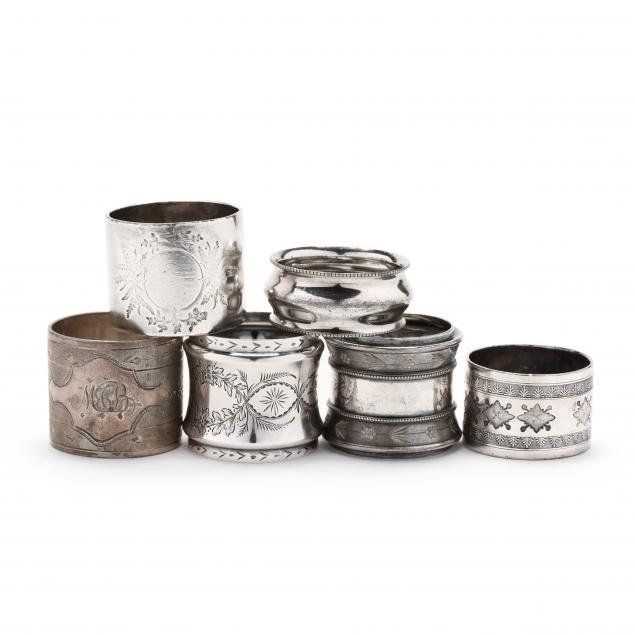 an-assembled-set-of-six-antique-silverplate-napkin-rings
