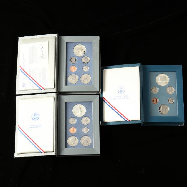 two-1986-prestige-proof-sets-and-a-1987-prestige-proof-set