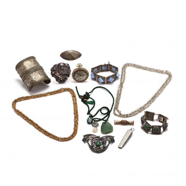 a-group-of-mostly-silver-jewelry-items