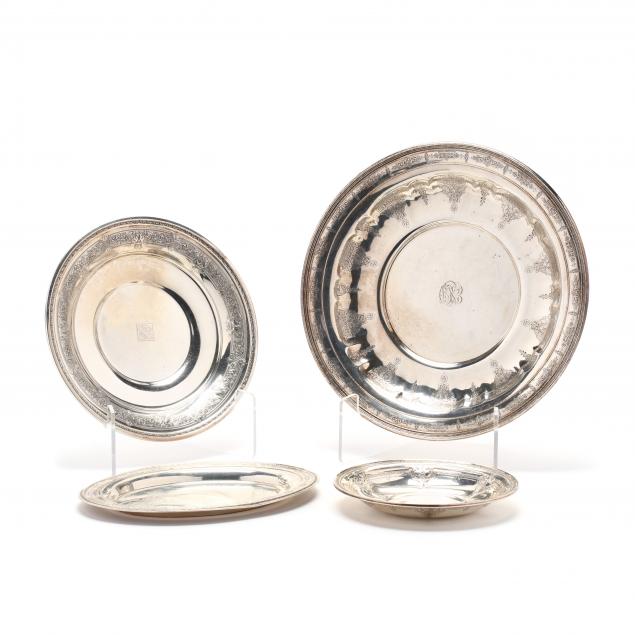 an-assembled-suite-of-four-sterling-silver-serving-dishes