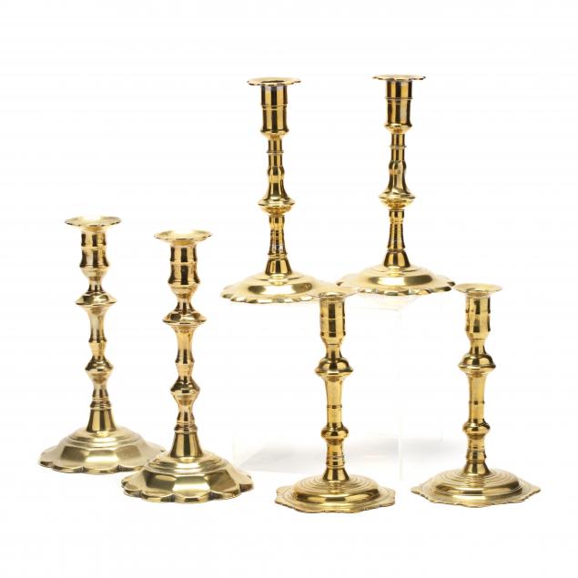 three-pair-of-18th-century-brass-candlesticks