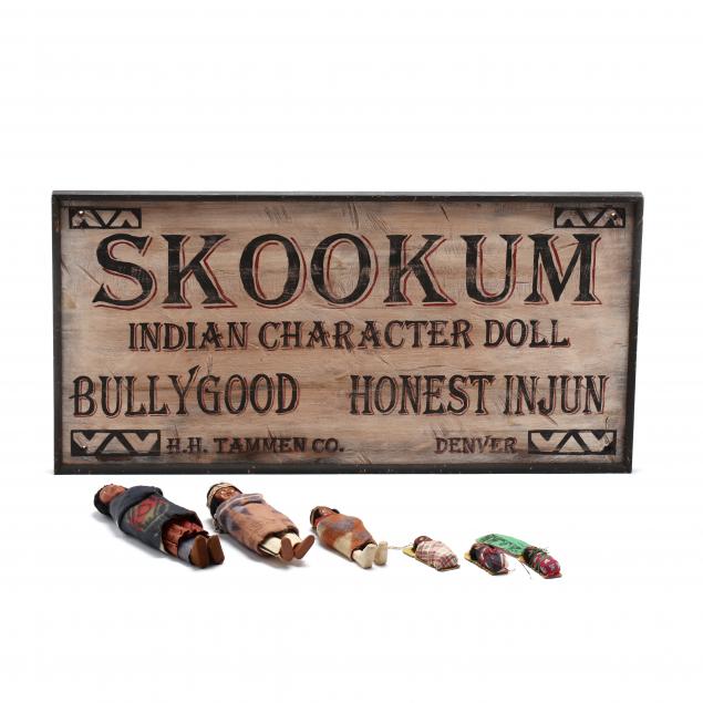 six-vintage-skookum-dolls-and-decorative-sign