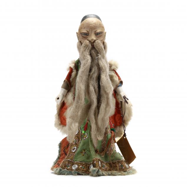 an-antique-chinese-wooden-puppet