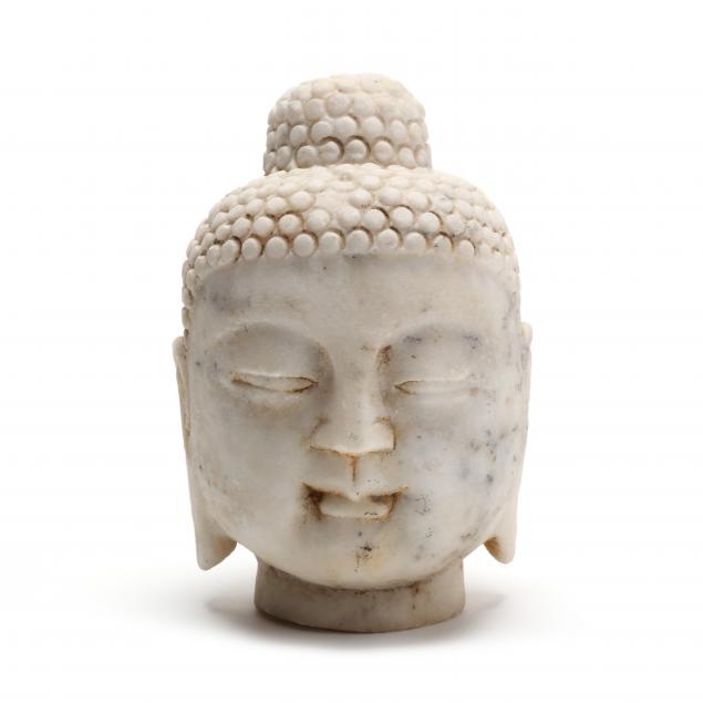 a-carved-marble-head-of-buddha