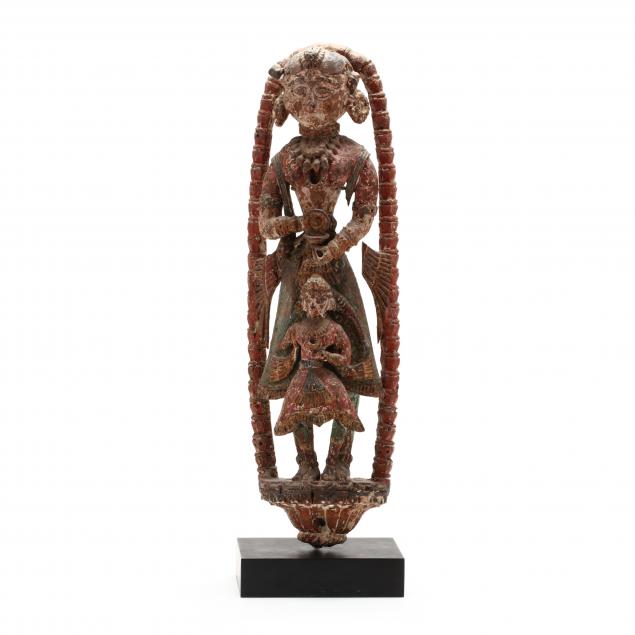 a-carved-wooden-southeast-asian-sculpture