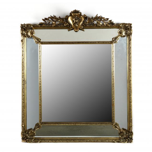 large-antique-carved-and-gilt-paneled-mirror