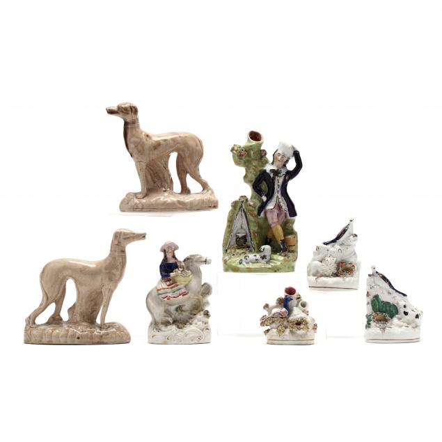 a-group-of-antique-pottery-figures