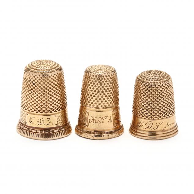 three-antique-gold-thimbles