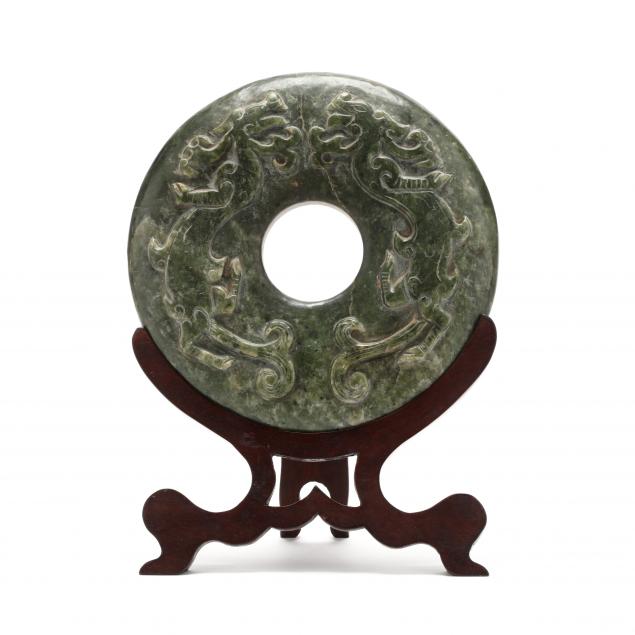 a-large-chinese-spinach-jade-bi-disc-with-stand