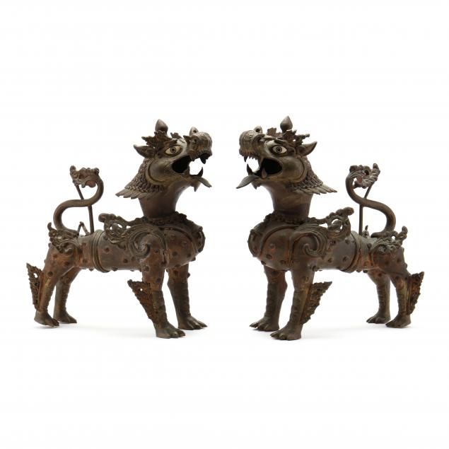 a-pair-of-chinese-tibetan-snow-lion-sculptures