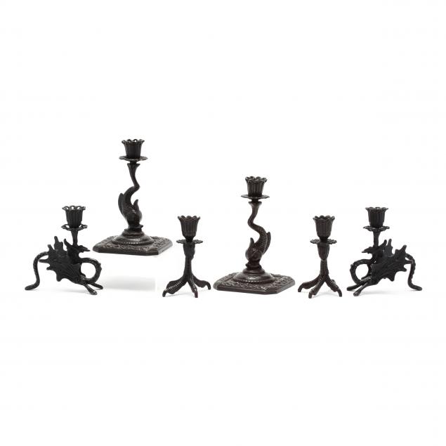 three-pairs-of-figural-iron-candlesticks