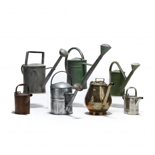 seven-vintage-watering-cans
