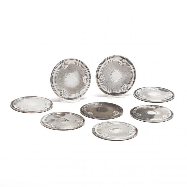 a-set-of-eight-christofle-silverplate-coasters
