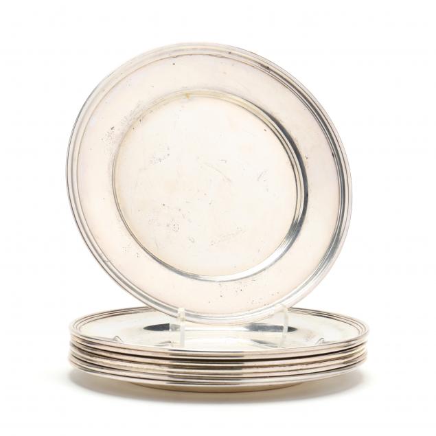an-assembled-set-of-eight-sterling-silver-bread-plates