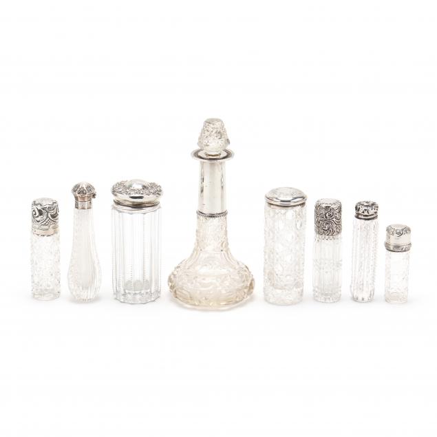 eight-cut-glass-and-sterling-lidded-scent-bottles