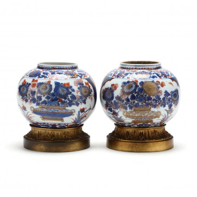 a-pair-of-chinese-imari-vases-with-gilt-ormolu-mounts