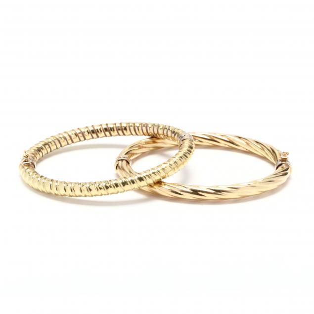 two-18kt-gold-bangle-bracelets-sabanis