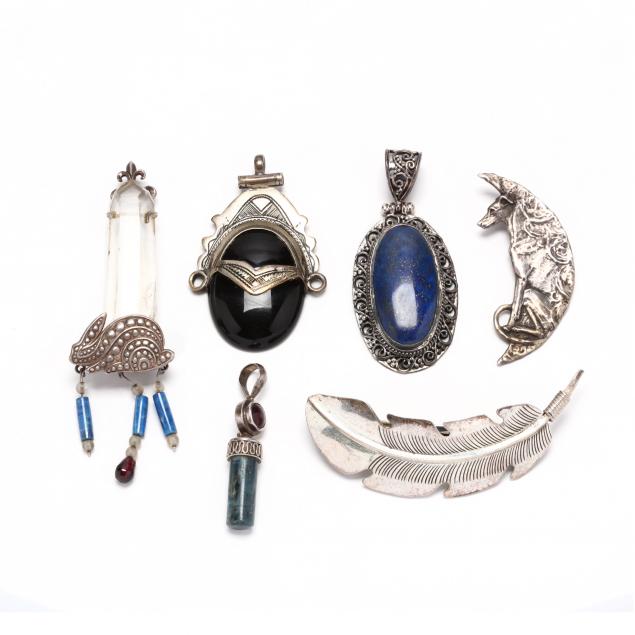 group-of-silver-and-gem-set-jewelry-items