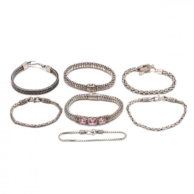seven-silver-bracelets