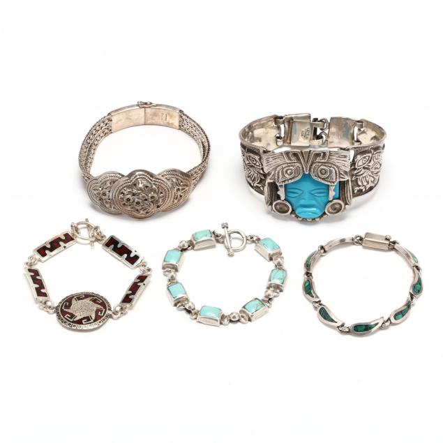 five-silver-and-gem-set-bracelets