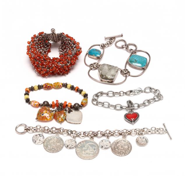 five-silver-and-gem-set-bracelets