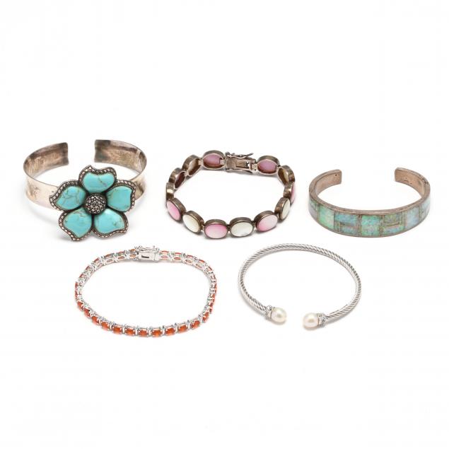 five-silver-and-gem-set-bracelets