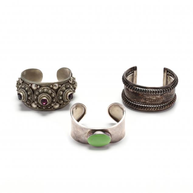 three-silver-cuff-bracelets