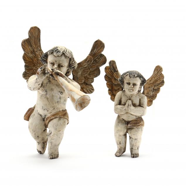 a-pair-of-carved-and-polychrome-painted-cherubs