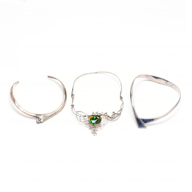 three-silver-and-gem-set-necklaces