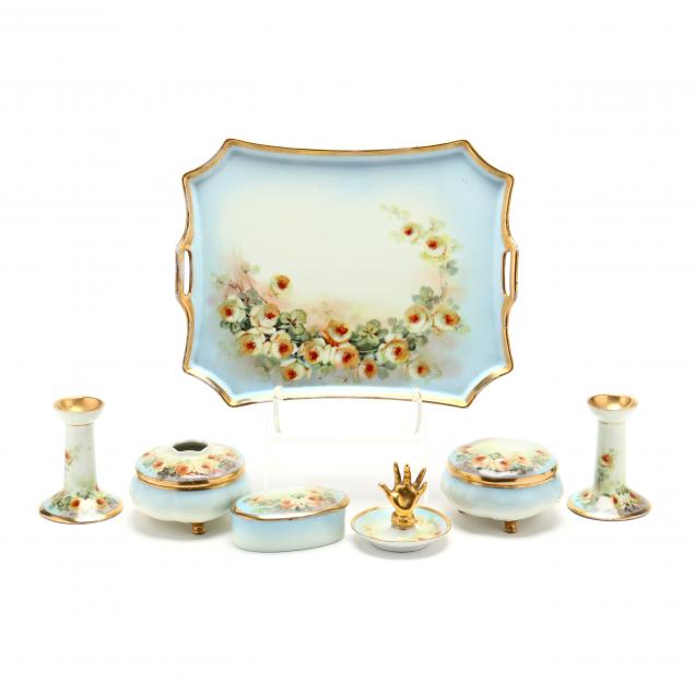 a-porcelain-seven-piece-dresser-set