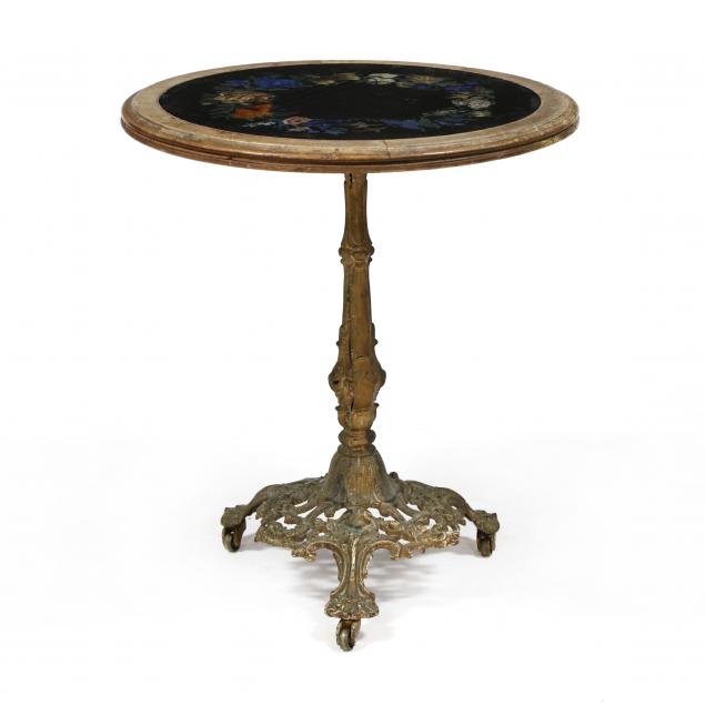 antique-iron-and-foil-back-table