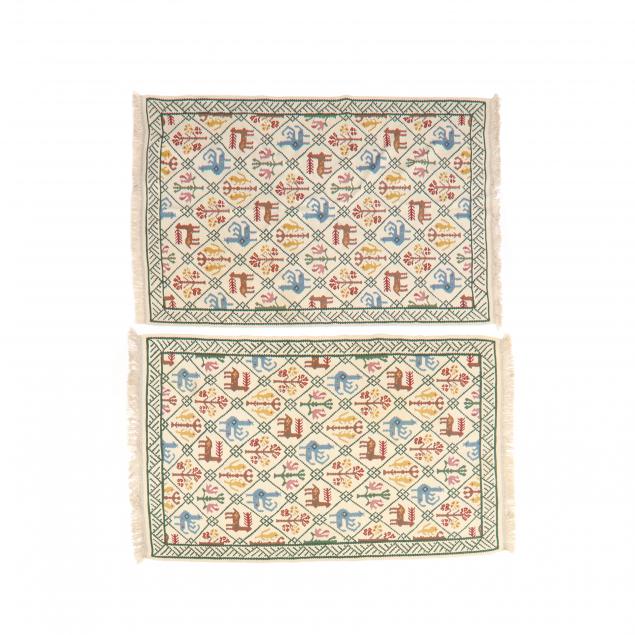 pair-of-flat-weave-figural-rugs
