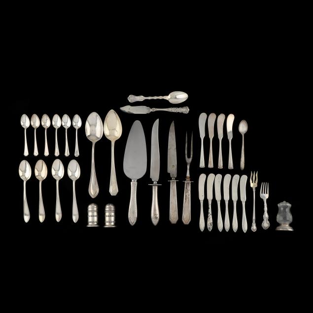 assorted-sterling-silver-flatware-and-shakers