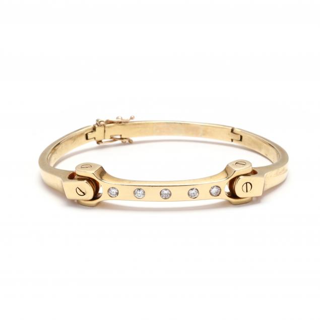 Sold at Auction: LOUIS VUITTON, A MONOGRAM BRACELET in 18ct white